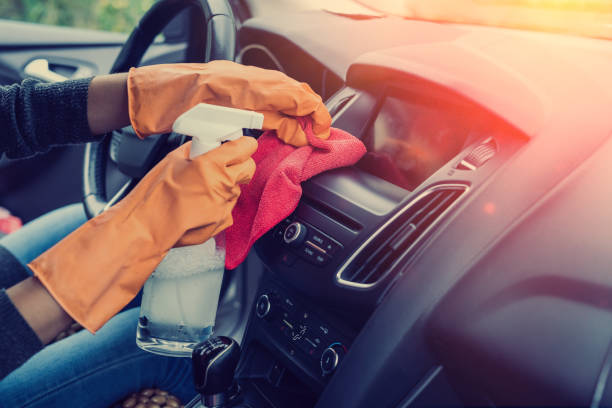 istock hand in protective gloves cleaning car interior from coronavirus covid-19 using microfiber clothes 1278119242