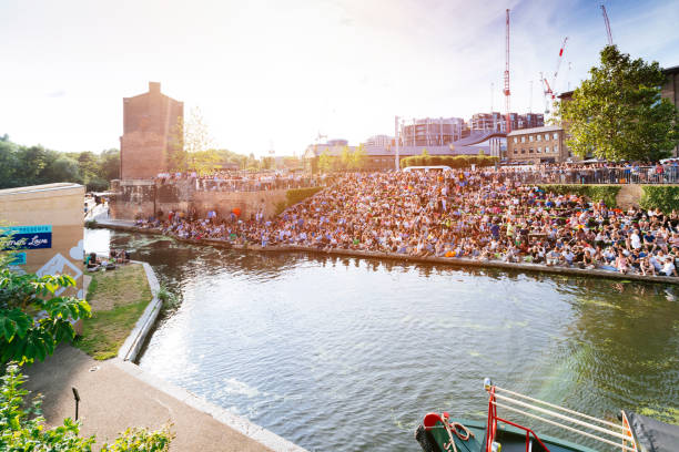 Wimbledon screenings outdoor at Granary Square King's Cross London, UK, July 12, 2019: Granary Square People enjoy outdoor, watch tennis live Wimbledon screenings on the big screen summer wimbledon seats stock pictures, royalty-free photos & images