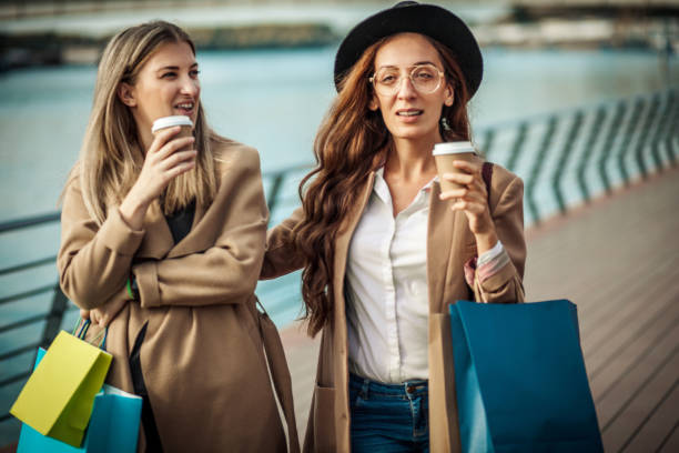 istock Woman shopping together 1278129619