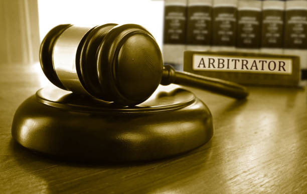 istock Arbitrator name plate and legal gavel 1278138500