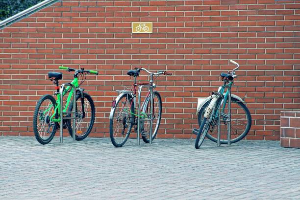 istock three bicycles are parked on the street 1278141844
