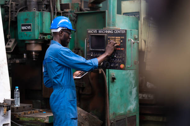 istock Male Engineer Working on digital tablet in Factory. black male engineer checking Quality control the condition of the machine 1278175087