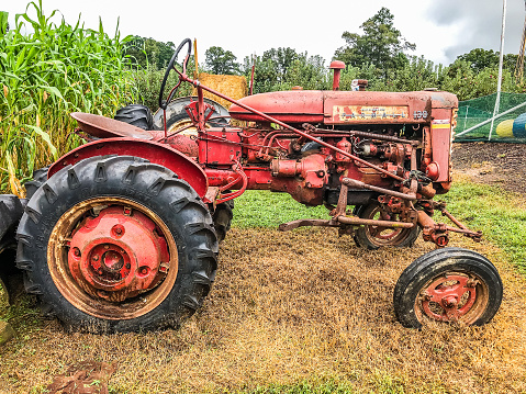 September 12, 2020. Georgia.  A picture of days gone by, this tractor sits as a testament of time passing.  This old tractor has spent many years working the farm.  Now at rest it sits broken and old as a reminder that time continues on.