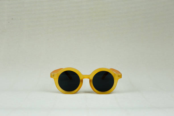istock kid baby sunglasses and beach hat 1278178625