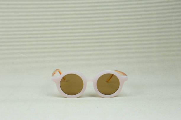 istock kid baby sunglasses and beach hat 1278179146