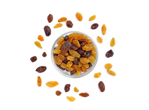 istock Dried raisins in glass on white background 1278187867
