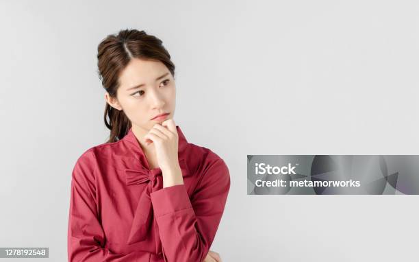 Thinking Asian Woman Stock Photo - Download Image Now - Women, Worried, Contemplation