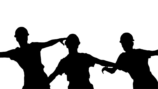 Medium shot. Back view. Silhouette Three male construction workers in hard hats synch dancing with their backs to the camera. Professional shot in 4K resolution. 045. You can use it e.g. in your medical, commercial video, business, presentation, broadcast