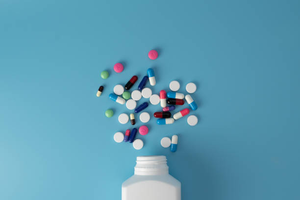 istock medicine pills on blue background Copy space for text Assorted pharmaceutical Healthy Eating, Lifestyle 1278203078