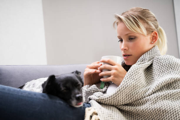 istock Sick Woman Sitting At Home With Mug 1278209212