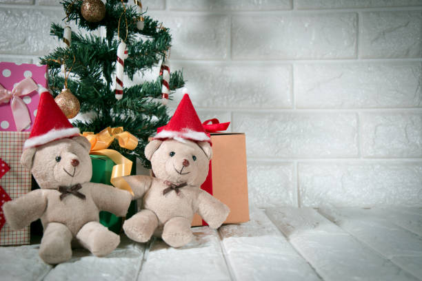 istock couple bear at silent night with Christmas tree and ornament, light up glitter background. Merry christmas and happy new year night. 1278212292