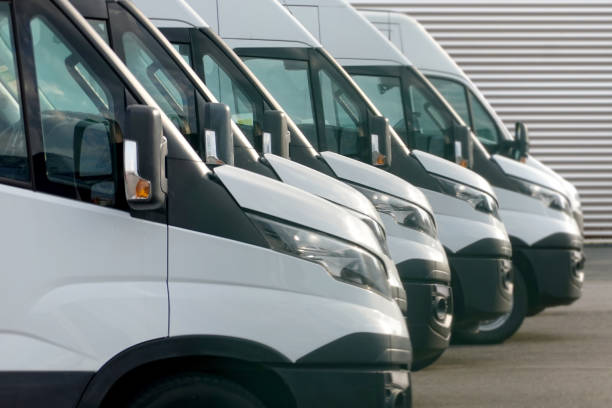 istock Delivery vans are in front of the warehouse 1278213851