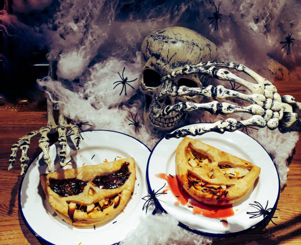 istock Halloween desserts with skull in the background 1278217034