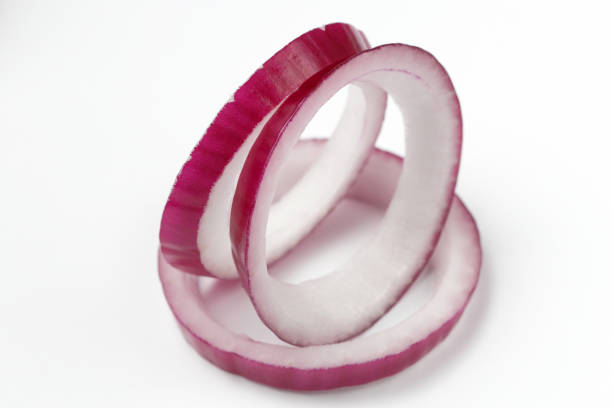 Red onion rings in original arrangement on a white background.