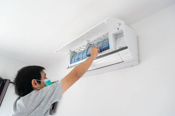 istock man hand hold air conditioner filter cleaning concept 1278220524