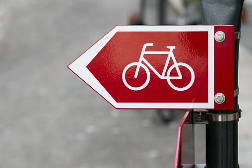 Bicycle Cycling Sign on Street and Urban Outdoors Background