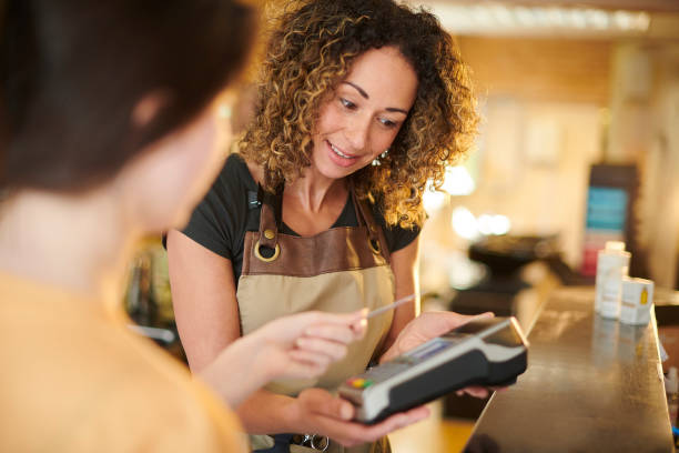 istock paying by card at the salon 1278224226