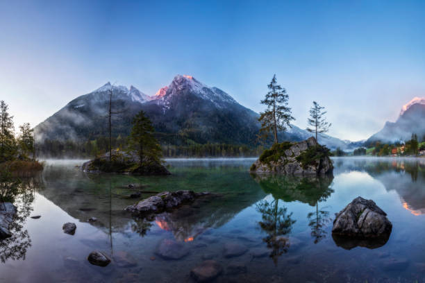 istock Sunrise at alpine lake Hintersee in Alps 1278226078