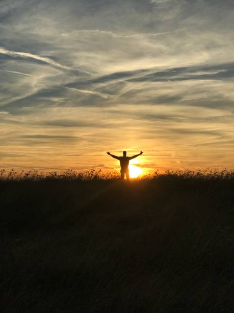 istock Silhouette of a man in a sunset 1278231551