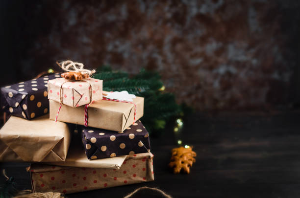 istock Christmas composition with craft gift boxes on wooden table 1278232949