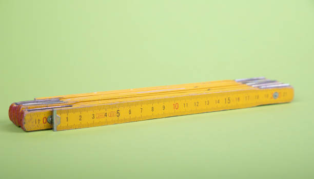 istock old yellow folding rule with centimeter measurement 1278233137
