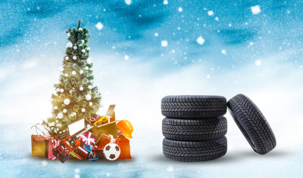 istock wheel rubber gift for Christmas on the christmas background 1278235673