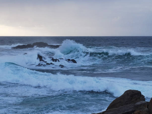 istock Waves against the rocks 1278239758