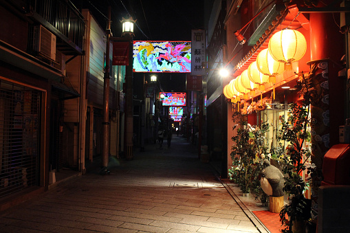 Lanterns, shops, and electronic billboards around the alley of Nagasaki Chinatown. Taken in August 2019.