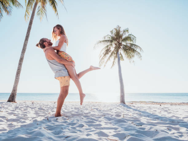 istock Couple on tropical beach 1278244085