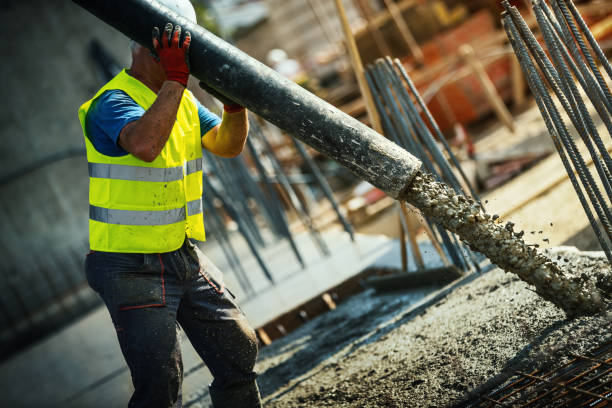 istock Pumping concrete over rebar mesh. 1278244116