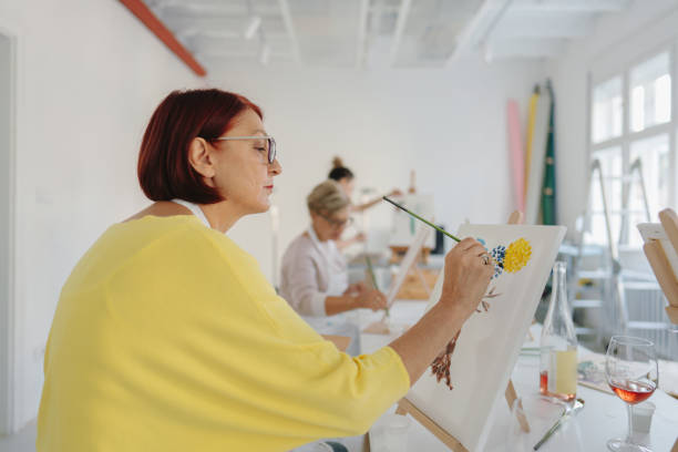 istock Mature woman taking a paint and sip class 1278244192
