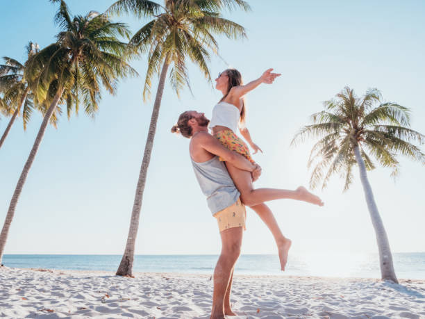 istock Couple on tropical beach 1278244224
