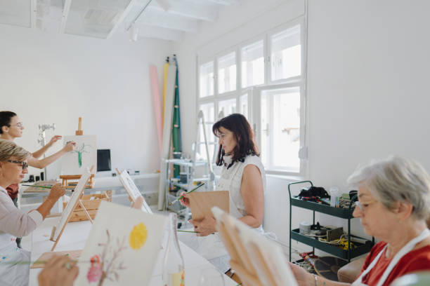 istock Senior women taking a paint and sip class 1278244325
