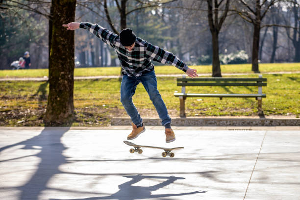 istock Skateboarder performing a kickflip in the skatepark 1278245881