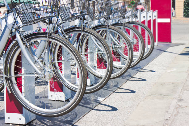 istock Five rental bicycles parked on a italian street - image with copy space 1278252156