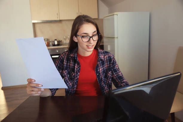 istock Young woman working from home 1278252464