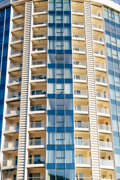 istock High rise multi-storey building in blue and beige with glazed balconies. 1278255072