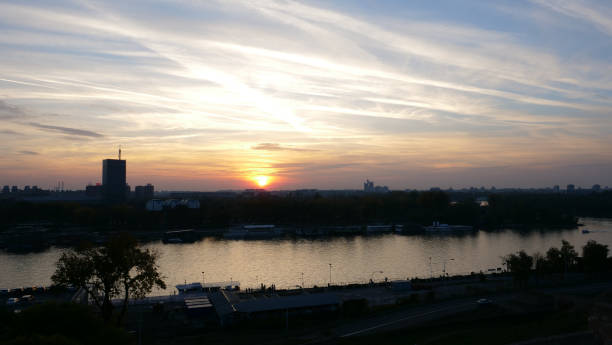 istock Dramatic Yellow and Orange Sunset Sky Cloudscape in Timelapse over Belgrade Serbia 1278256615