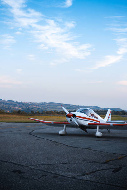 istock Propeller airplane parked at sunset 1278256840