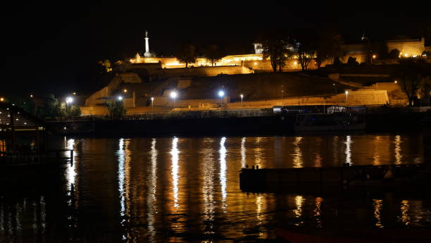 istock Belgrade Fortress Kalemegdan Night Time Lapse with Water Reflections on River 1278258022