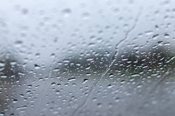 istock Blur the background of rain drops on the windshield. 1278258804