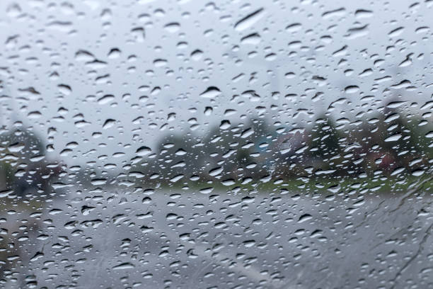 istock Blur the background of rain drops on the windshield. 1278259350