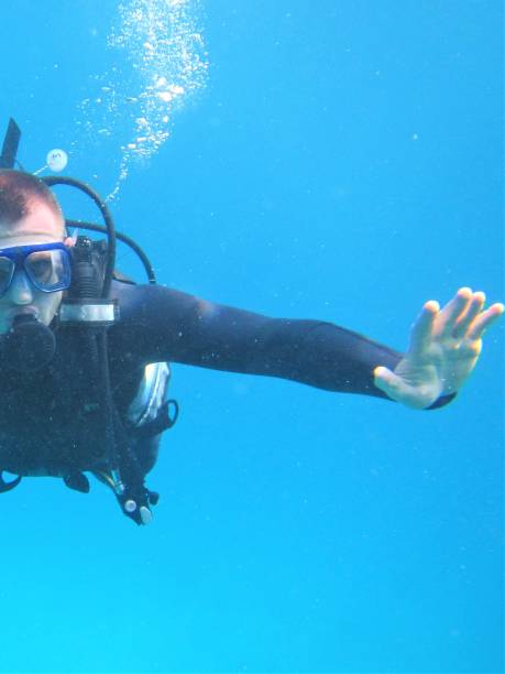 istock Light-skinned man in diving gear is diving underwater. Active lifestyle concept. 1278264604