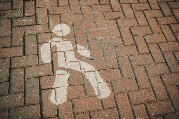 Pedestrian crossing in urban street, sign and symbol, texture
