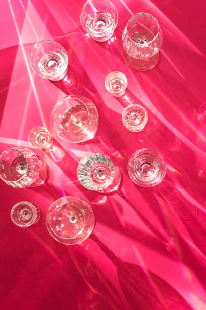 istock Empty crystal glasses shade and sunshine top view 1278269055