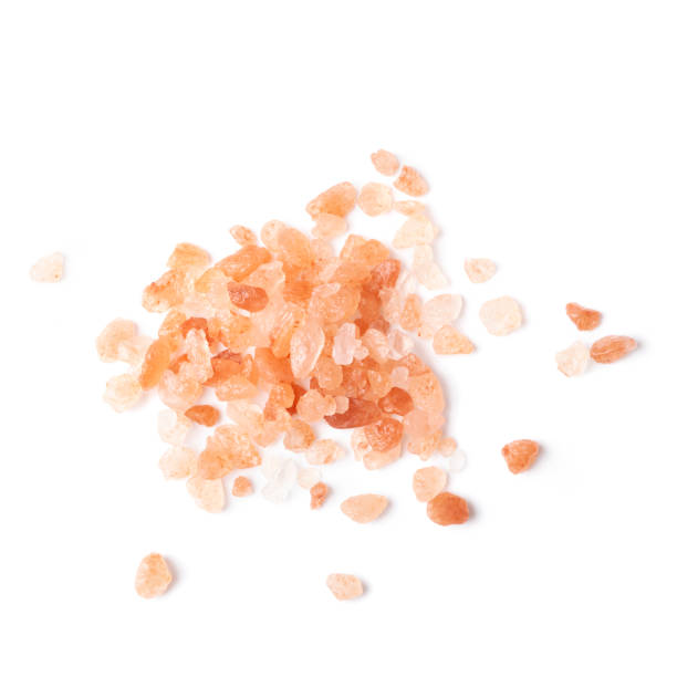 istock Himalayan pink salt raw crystals Isolated on White Background. 1278269828