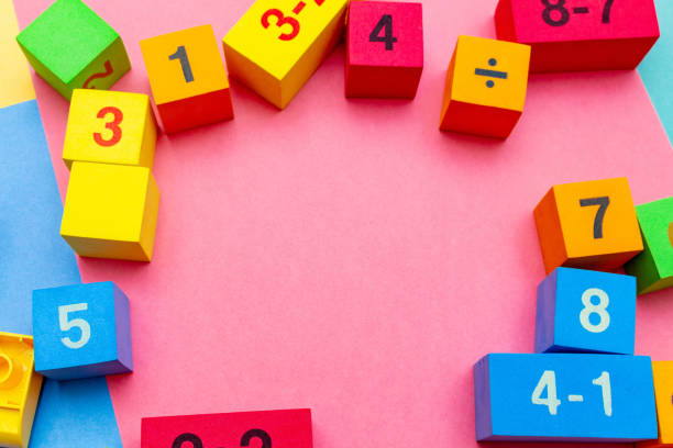 istock child kid colorful education toys cubes with numbers math pattern background on the bright background. Flat lay. Childhood infancy children babies concept. 1278276252