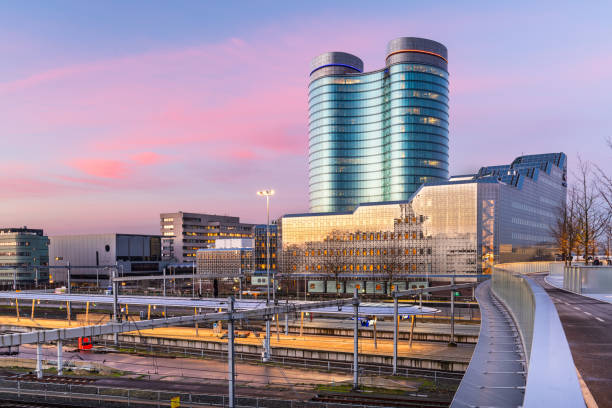 Utrecht, Netherlands Cityscape Utrecht, Netherlands cityscape over train station platforms at dawn. dutch architecture stock pictures, royalty-free photos & images