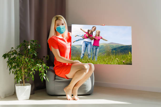 istock woman wear with protective face mask at home 1278278432