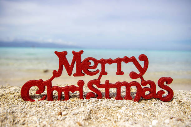 istock Merry Christmas decoration on a tropical island beach 1278278713